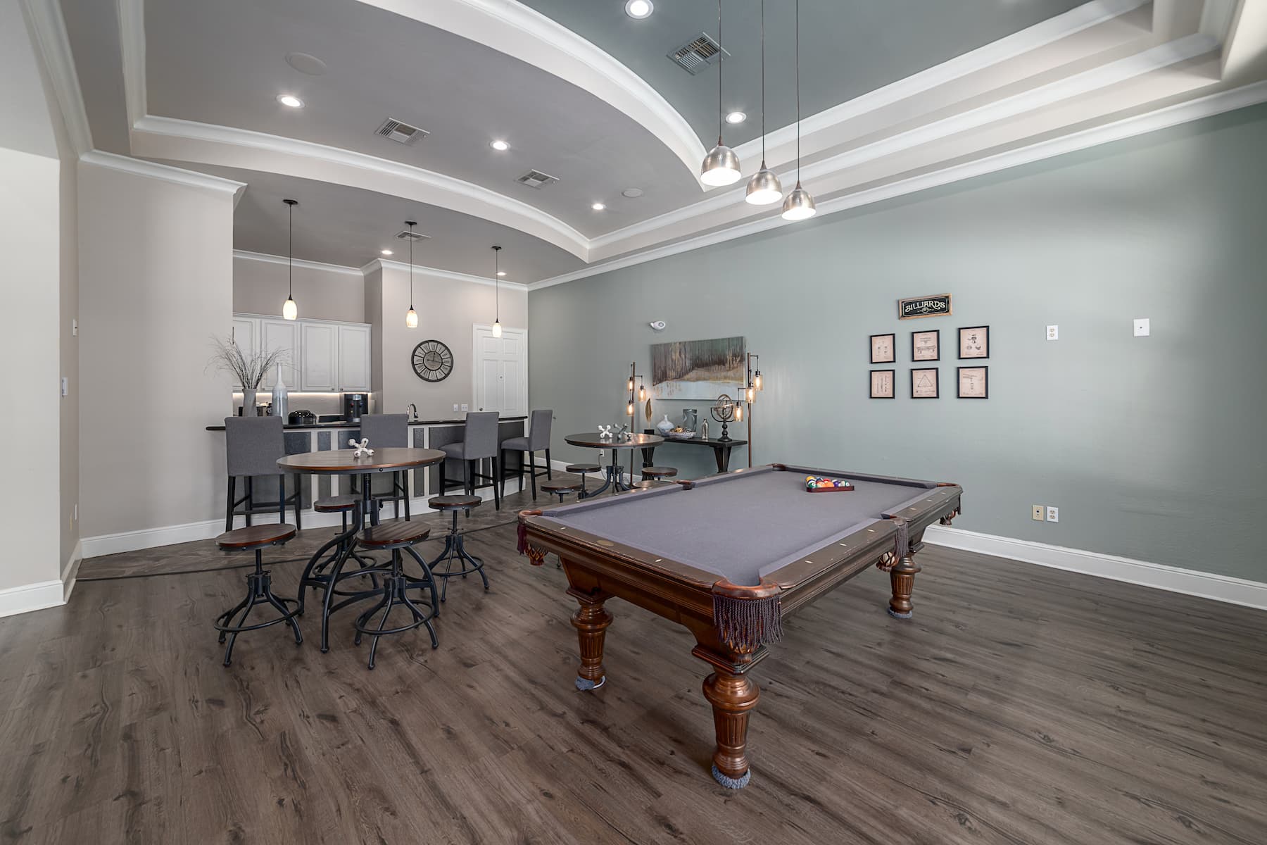 enjoy a game of pool or a conversation with friends in our game room